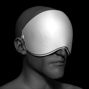 May include: A grayscale image of a person wearing a white, textured visor that covers their eyes. The visor has a thin, dark line around the edge.