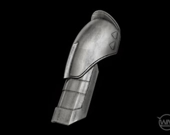 May include: A silver metal elbow guard with a textured surface and a triangular design on the top.