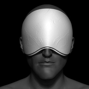 May include: A person wearing a white, textured blindfold over their eyes.
