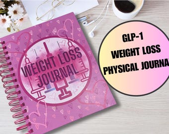 May include: A pink spiral bound journal with a weight loss theme. The cover features a graphic of syringes and the text "WEIGHT LOSS JOURNAL". The journal is titled "GLP-1 WEIGHT LOSS PHYSICAL JOURNAL".