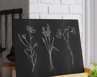 Planche à découper en verre de dessin au trait botanique noir et blanc | Illustration minimale de fleurs sauvages