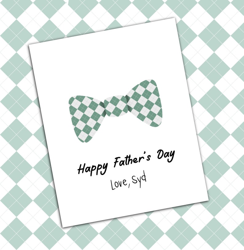 May include: A white card with a green and white checkered bow tie and the text "Happy Father's Day Love, Syd".