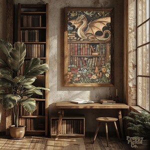 May include: A framed print depicts a golden dragon perched atop a bookshelf filled with books. The artwork is set in a room with a wooden desk, stool, and a tall bookshelf. A large potted plant and a window with natural light complete the scene.