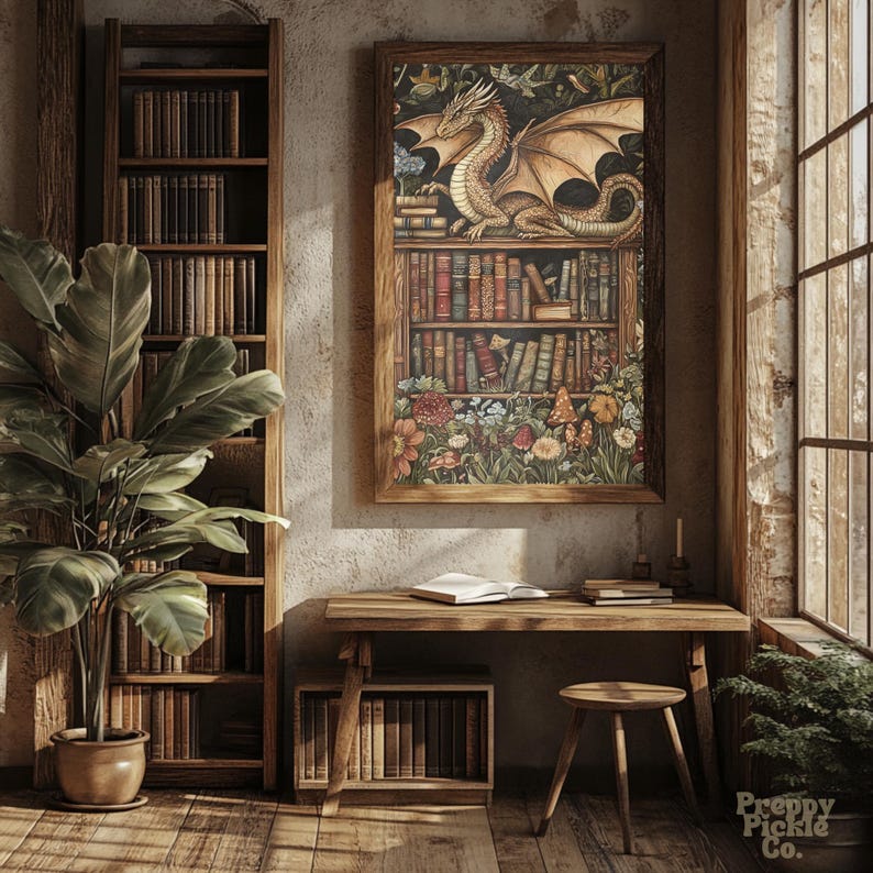 May include: A framed print depicts a golden dragon perched atop a bookshelf filled with books. The artwork is set in a room with a wooden desk, stool, and a tall bookshelf. A large potted plant and a window with natural light complete the scene.