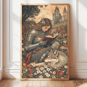 May include: A framed art print depicts a medieval scene. A person in armor reads a book while seated in a flower-filled meadow with a wolf. A castle is in the background. The artwork has a vintage, storybook style.