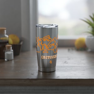 Puede incluir: Una taza de viaje de acero inoxidable con un diseño gráfico naranja brillante y el texto "(BITCOIN)" en el lateral.
