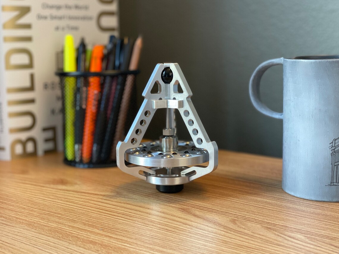 JWQFBC Motion Gyroscope Toy Artistic Desktop Home Ornament For Shelf Office Cabinet