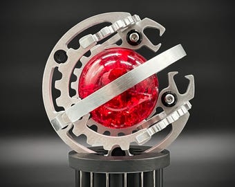 Esfera de dragón entrelazada mecánica sobre soporte de exhibición / Globo de engranajes de escritorio con esfera de vidrio central
