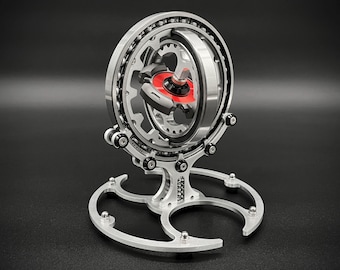 Giroscopio galáctico multieje decorativo / Fidget spinner mecánico / Escultura cinética de escritorio en aluminio mecanizado