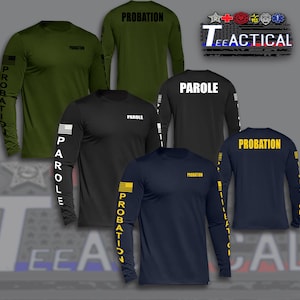 May include: Long-sleeved shirts in olive green, black, and navy blue, featuring the words "PROBATION" and "PAROLE" in bold lettering. The sleeves display the American flag and the words "PROBATION" or "PAROLE" vertically. The shirts are from "Tee Tactical".
