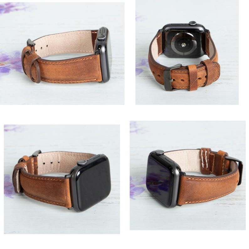 May include: A brown leather watch band for an Apple Watch. The band is shown on a white wooden surface.