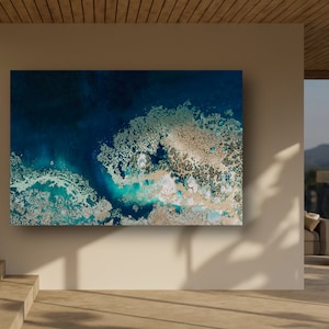 May include: Abstract painting featuring blue, white and gold colours. The artwork depicts a swirling, textured pattern reminiscent of water and coral.