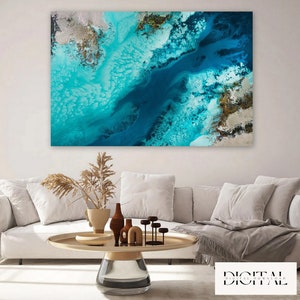 May include: Abstract art print featuring a swirling blue and turquoise design with hints of gold. The design resembles a flowing river or ocean current.