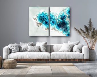 May include: Two abstract paintings with a blue and gold color scheme. The paintings are on a white background and feature a swirling, organic design.