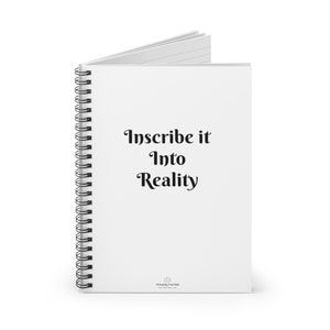 May include: A white spiral bound notebook with the text "Inscribe it Into Reality" printed in black. The notebook has a small lotus flower logo at the bottom.