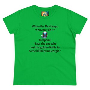 May include: Green t-shirt with a skull graphic and the text "When the Devil says, "You can't do it." I respond, "Says the one who lost his golden fiddle to some hillbilly in Georgia."