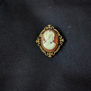 Avon Brooch Locket