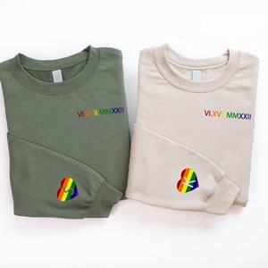 Customized LGBT Roman Numeral Anniversary Sweatshirt, Rainbow Inıtial Heart On Sleeve, LGBTQ Matching Lesbian Gay Couples Anniversary Gift