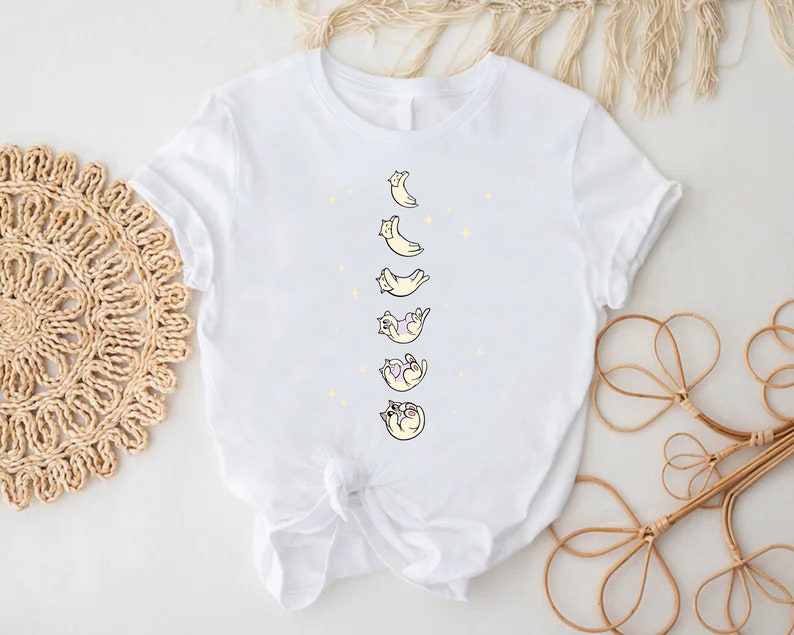 a white shirt with a picture of a baby on it