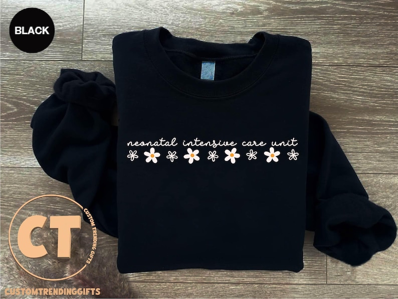 a black sweatshirt with the words remarkable adventure await on it
