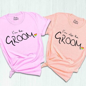 two shirts that say i'm not the groom and i'm the bride