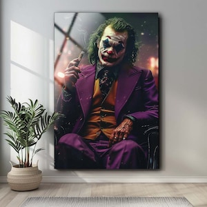 May include: A digital art print of the Joker from the movie "Joker" with green hair, white face paint, and a purple suit. He is holding a lit cigar and sitting in a chair.