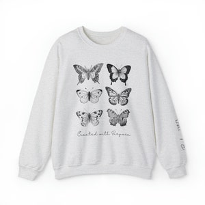 Created with Purpose Butterfly Heavy Blend™ Crewneck Sweatshirt