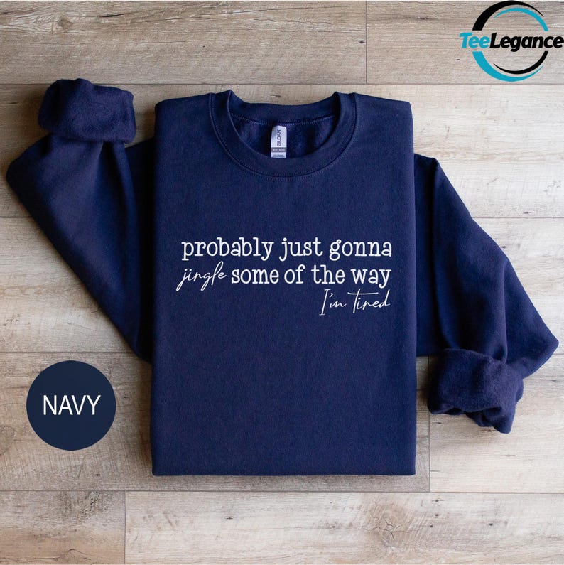 Navy sweatshirt with white text on it.