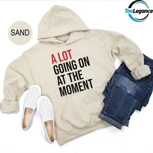 a sweatshirt with the slogan a lot going on at the moment