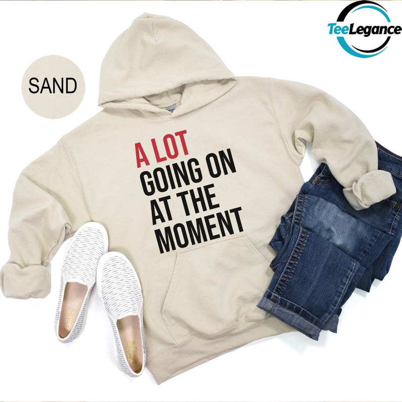 a sweatshirt with the slogan a lot going on at the moment