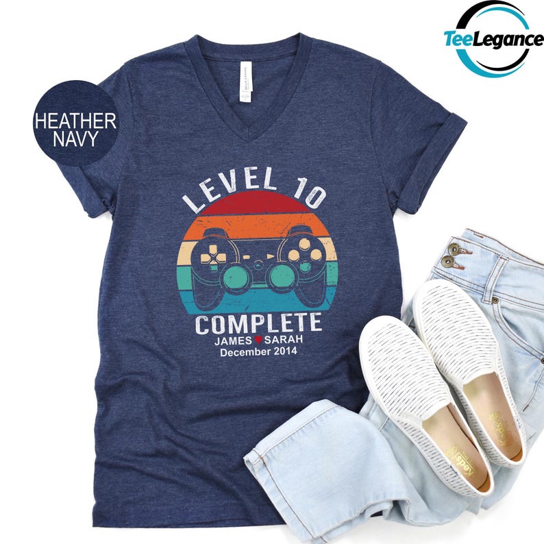 a t - shirt with a video game controller on it