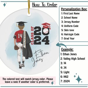 May include: A personalized graduation ornament featuring a baseball player wearing a red jersey with the number 14, a black graduation cap and gown, and a baseball in his hand. The ornament is decorated with a blue and white watercolor background and the text "Class of 2024".