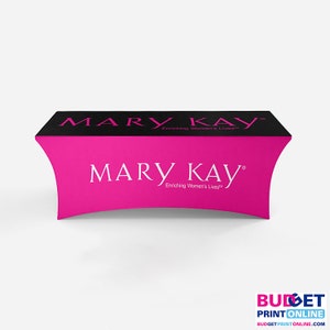 May include: Black and pink fitted table cover with the text "MARY KAY" and the tagline "Enriching Women's Lives" printed on it.