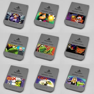 May include: Nine gray Sony PlayStation memory cards arranged in a grid. Each card features the PlayStation logo and text, with a unique rectangular graphic label depicting various video game characters including Rayman, Gex, and Jersey Devil.