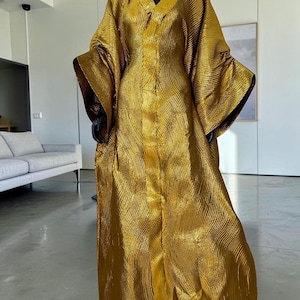golden silk orb weaver dress Golden spider silk V&A