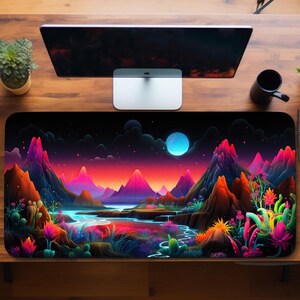 May include: A colourful, abstract landscape featuring mountains, a river and a glowing moon. The scene is set against a dark blue sky with stars. The mountains are a mix of pink, purple and blue, and the river is a vibrant turquoise. The moon is a bright white with a yellow glow.