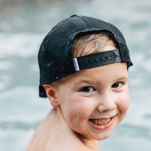 Solid black waterproof snapback for kids