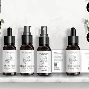 May include: Four dark brown glass bottles with black caps and white labels, labelled "Oil Serum", "Hand Serum", "Body Mist", and "Hair Serum". The labels feature botanical illustrations and text. The image includes text that says "Editable in Canva" and "Bonus Items Inside".