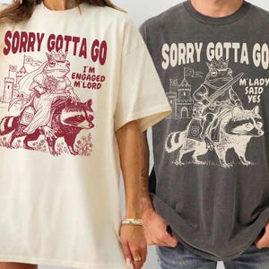 May include: A set of three ceramic mugs with a speckled, matte finish. Each mug features a different color: light blue, cream, and gray. The mugs have a simple, modern design with a rounded shape and a handle.