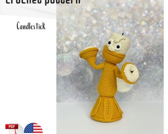 May include: A crocheted candlestick figure in yellow and cream colors. The figure has a cylindrical body, flared base, and two arms with circular details. The text "Crochet pattern" and "Candlestick" are visible.