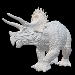 May include: A white, detailed, 3D printed model of a Triceratops dinosaur. The model is posed in a walking position with its head turned to the side.