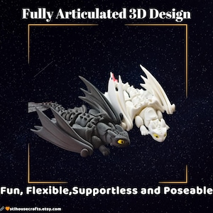 May include: Two 3D-printed dragon figures, one dark gray and one white, are displayed against a dark blue background with star-like specks. The dragons have articulated designs and are labeled as fun, flexible, supportless, and poseable.