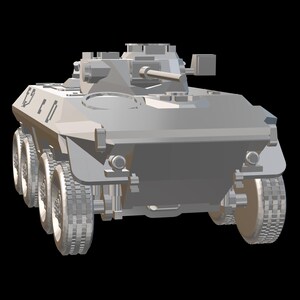 May include: A gray military armored vehicle with a large cannon on top. The vehicle has six wheels and is on a black background.
