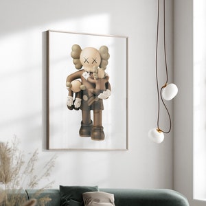 May include: A brown and beige illustration of a cartoon character holding two smaller cartoon characters. The larger character has a large head with X-shaped eyes and a small mouth. The smaller characters are also brown and beige and have similar features.