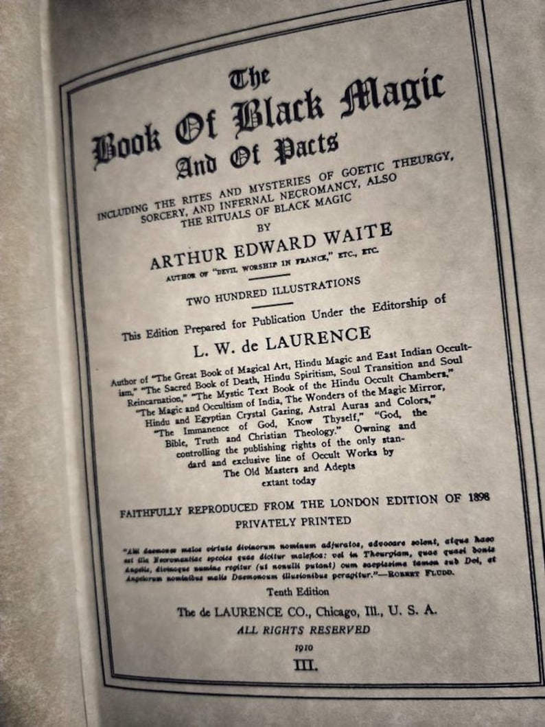 May include: A vintage book cover with the title "The Book of Black Magic and of Pacts" by Arthur Edward Waite. The book includes illustrations and is a reprint of the 1898 London edition.