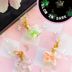 Tapón que brilla en la oscuridad con forma de polvo de estrellas, amuleto de poción con forma de estrella, tapón antipolvo para el conector de audio de los auriculares del mando de juegos Switch