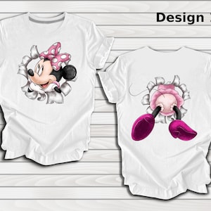 May include: Two white t-shirts with a cartoon image of Mickey Mouse peeking out of a torn hole. The left shirt shows Mickey Mouse's face, while the right shirt shows Mickey Mouse's legs and feet.
