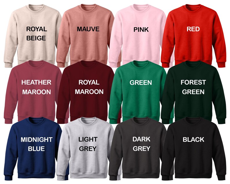 Puede incluir: Un conjunto de 12 sudaderas con cuello redondo en varios colores, incluyendo beige real, malva, rosa, rojo, granate jaspeado, granate real, verde, verde bosque, azul medianoche, gris claro, gris oscuro y negro. Cada sudadera tiene un color diferente y una etiqueta de texto con el nombre del color.