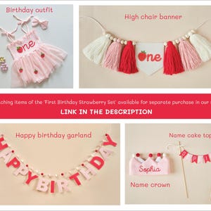 K&ouml;nnte beinhalten: Ein rosa-rotes Dekorationsset f&uuml;r eine erste Geburtstagsfeier mit Erdbeer-Motiv. Das Set beinhaltet eine Girlande, einen Kuchentopper, eine Krone und ein Outfit. Die Girlande sagt "happy birthday". Der Kuchentopper sagt "Sophia".