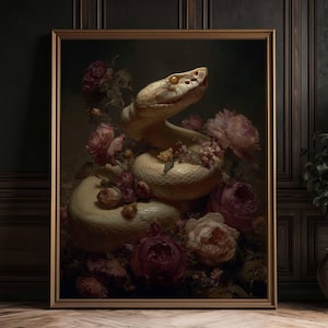 May include: A framed wall art print featuring a coiled cream-colored snake with a prominent yellow eye, surrounded by a cluster of deep red, pink, and pale blush roses. The composition is set against a dark, moody background with soft lighting.